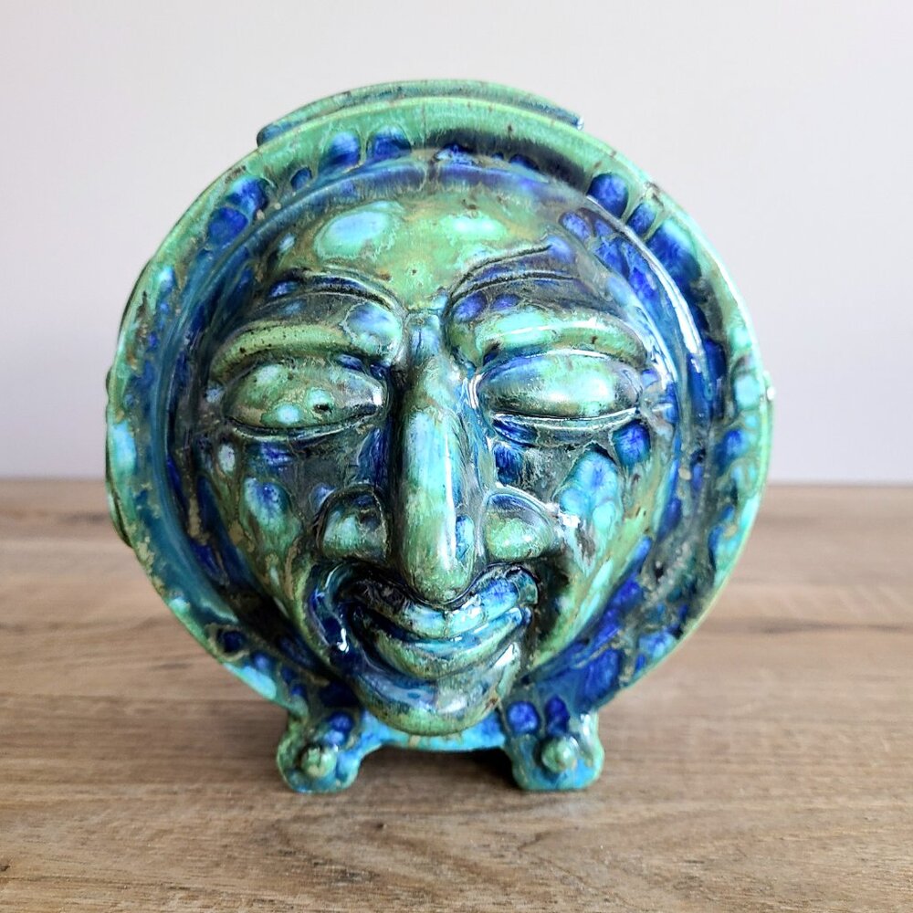 Rare handmade pottery whimsical vase or money saver with face image. Signed.